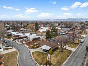 Birds eye view of property with a residential view and a mountain view