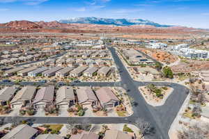 Birds eye view of property with a residential view and a mountain view