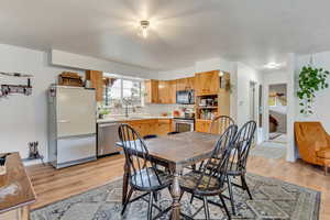 Dining room featuring light wood-type flooring