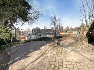 View of front of home with a patio