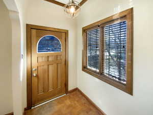 Foyer featuring baseboards