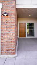 Property entrance with brick siding