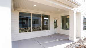 Entrance to property with a patio area