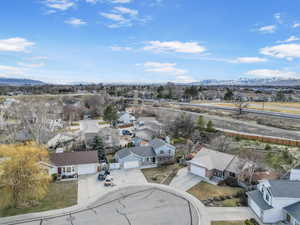 Birds eye view of property featuring a residential view and a mountain view