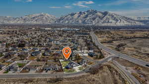 Birds eye view of property featuring a residential view and a mountain view