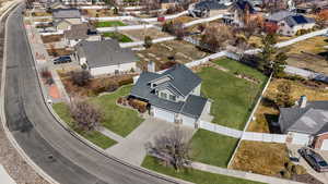 Birds eye view of property with a residential view