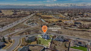 Birds eye view of property featuring a mountain view and a residential view