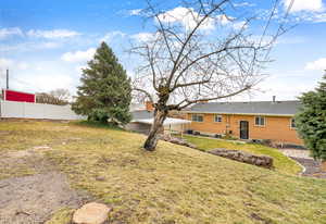 View of yard with fence