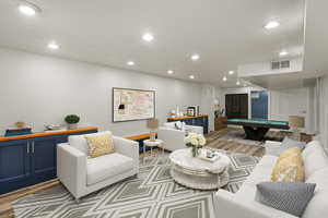 Living area with recessed lighting, light wood-style flooring, visible vents, and pool table