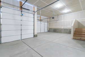 Garage featuring a garage door opener