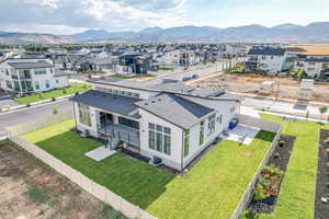 Birds eye view of property featuring a residential view and a mountain view