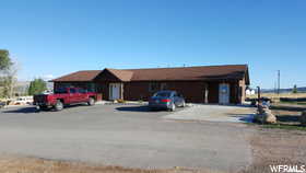 Exterior space with uncovered parking