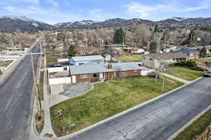 Drone / aerial view featuring a residential view and a mountain view