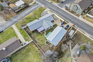 Birds eye view of property with a residential view