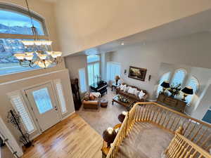 Foyer featuring stairway, looking down on entry and family room