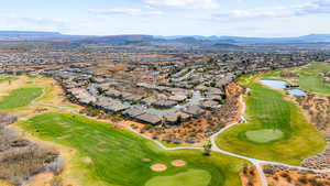 Aerial view with a residential view, golf course view, and a water and mountain view