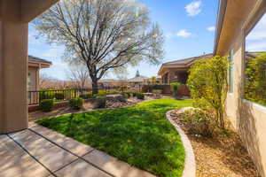 View of yard with fence