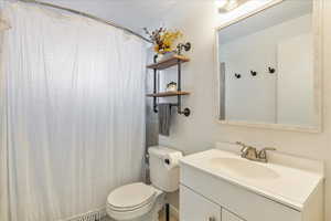 Bathroom with vanity and toilet