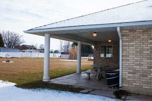 View of patio with fence