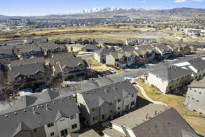 Drone / aerial view with a residential view and a mountain view