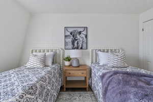 Bedroom with brick wall
