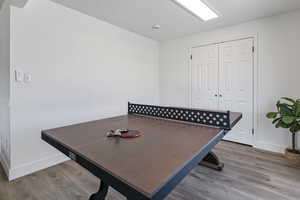 Dining area featuring baseboards and wood finished floors