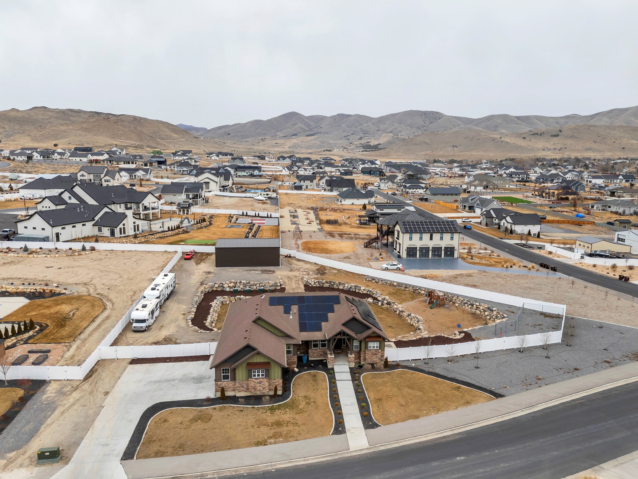 Drone / aerial view featuring a residential view and a mountain view