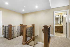 Hall with recessed lighting, upstairs landing