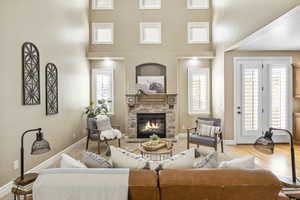 Family Room high ceiling, and a fireplace