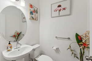 Bathroom featuring toilet and a sink