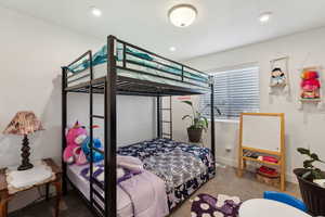 Bedroom with baseboards, carpet flooring, and recessed lighting