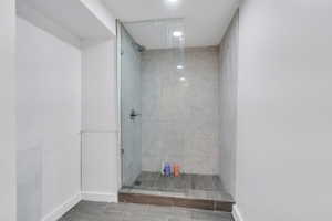 Bathroom featuring a shower stall