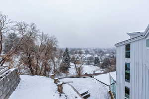 View of yard layered in snow