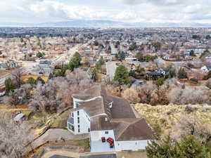 Birds eye view of property with a residential view and a mountain view