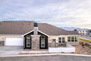 View of front of property featuring a fenced in patio