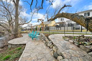 View of patio / terrace with a residential view and fence