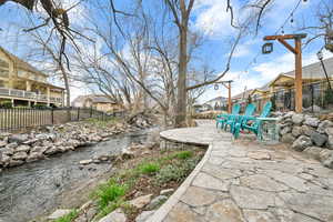 View of yard featuring fence