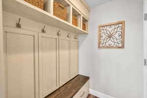 Mudroom featuring baseboards