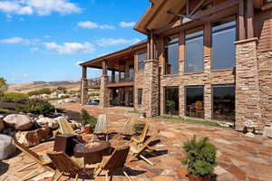 View of patio featuring a fire pit