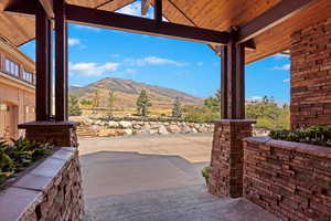 View of patio / terrace featuring a mountain view