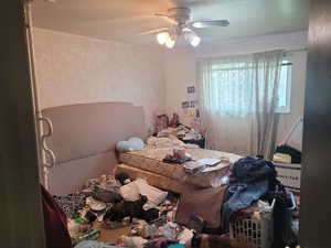 Bedroom with a ceiling fan