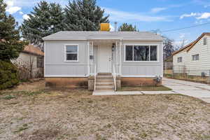 View of front of house featuring board and batten siding