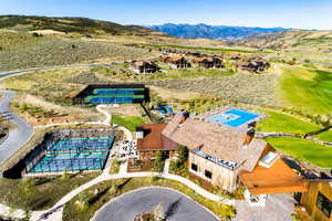 Birds eye view of property featuring a mountain view