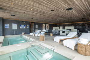 Indoor pool with an indoor hot tub