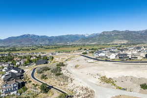 Drone / aerial view with a mountain view and a residential view