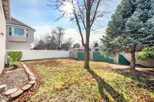 View of yard featuring a fenced backyard