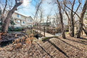 View of yard featuring fence