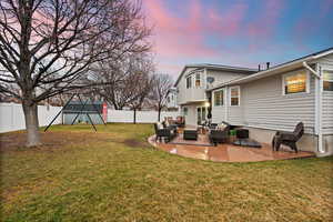 View of yard featuring a patio area, a fenced backyard, and outdoor lounge area