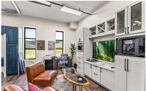 Living area featuring dark wood finished floors