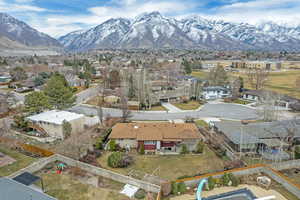 Drone / aerial view with a residential view and a mountain view